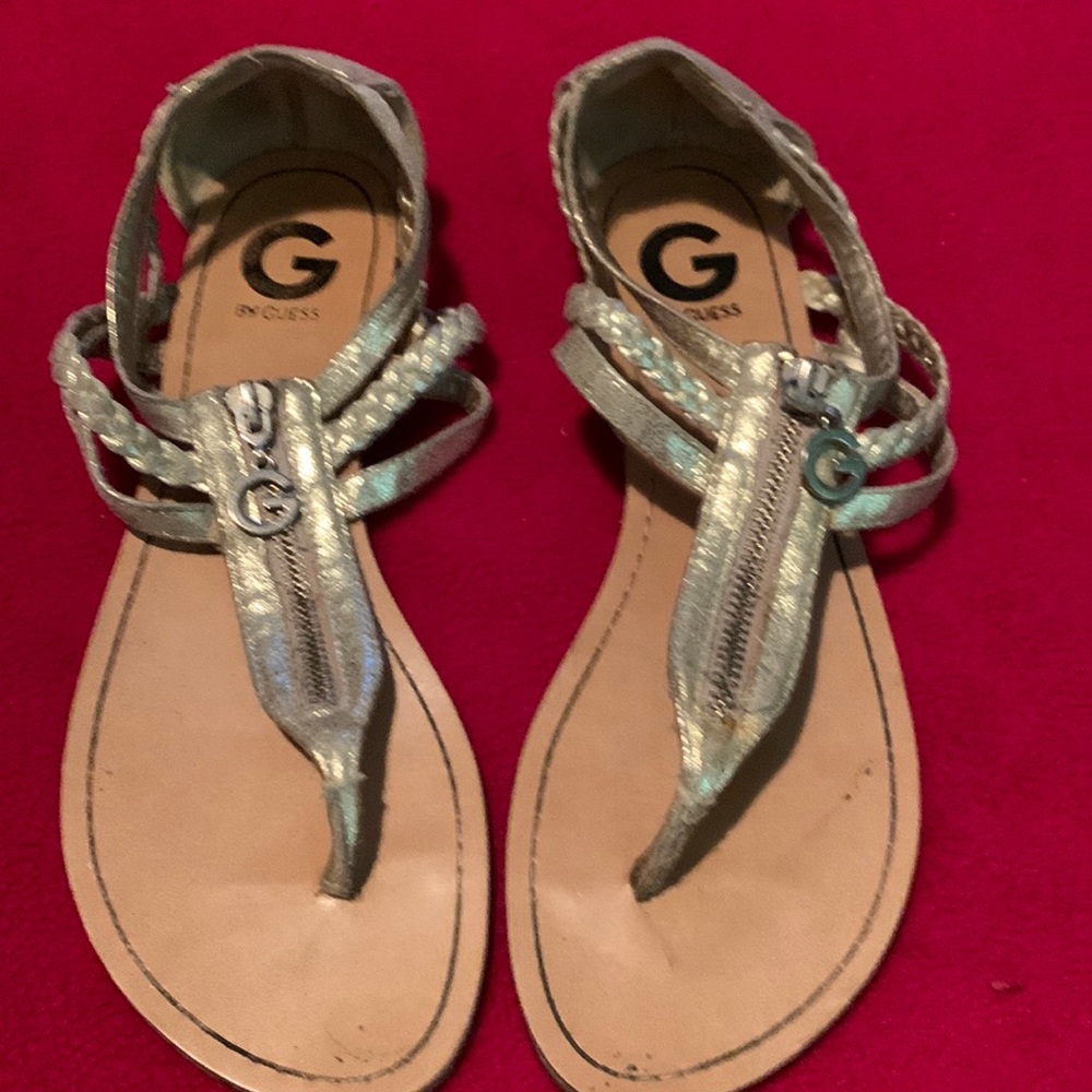 Metallic gold zippered G by guess thong slide
